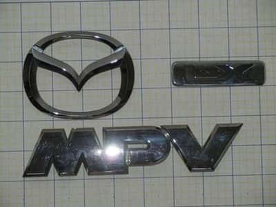 2000-2006 MAZDA MPV LX trunk emblem badge logo OEM LC62-51-761