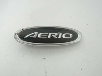 2002-2007 SUZUKI AERIO right side fender front passenger side emblem logo OEM