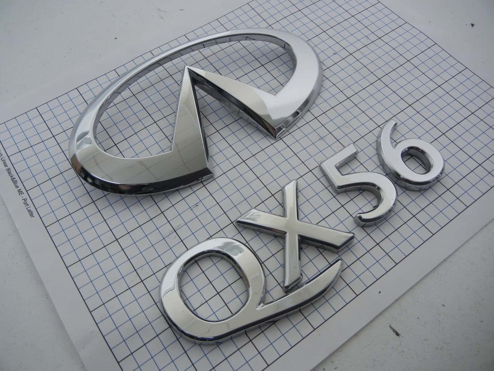 2004-2007 Infiniti QX56 OEM Rear Trunk Emblem Logo Badge Set 93491-7S600