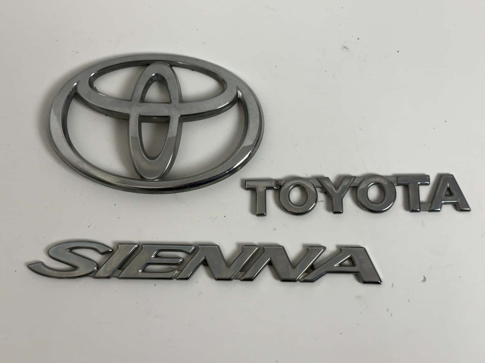 2004-2010 Toyota Sienna XL20 OEM rear liftgate emblem set 75441-08030