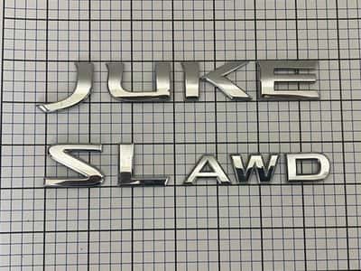 Nissan JUKE SL AWD trunk liftgate emblem letters genuine OEM