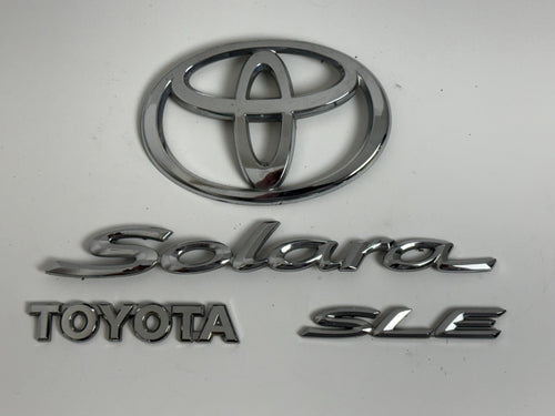 2004-2007 Toyota Solara SLE XV30 OEM rear liftgate emblem set 75442-AA040