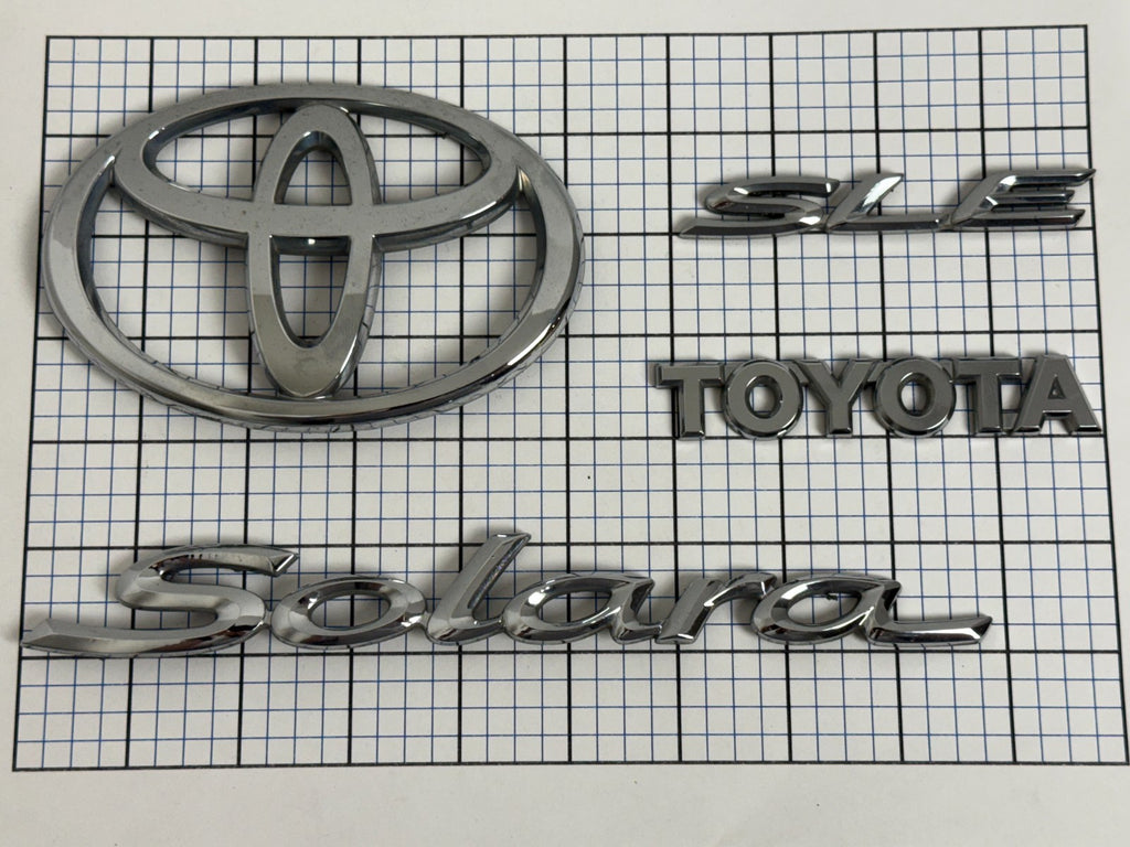 2004-2007 Toyota Solara SLE XV30 OEM rear liftgate emblem set 75442-AA040