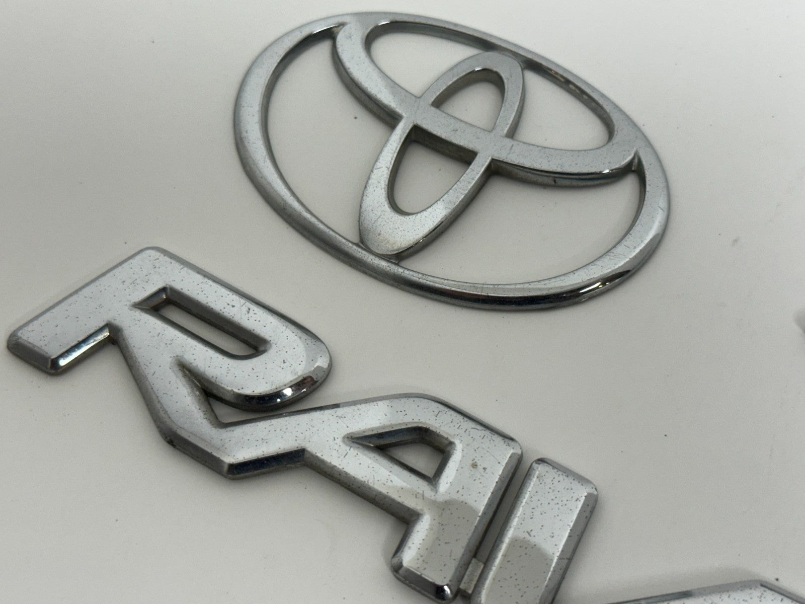 2006-2008 Toyota RAV4 L 4WD XA30 OEM rear liftgate emblem set 75431-0R060