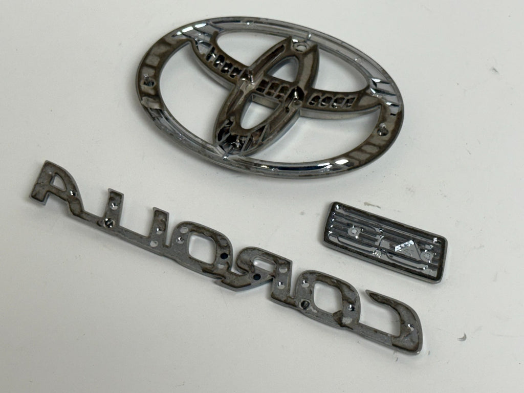 2011-2013 Toyota Corolla LE OEM rear liftgate emblem set 75442-02380
