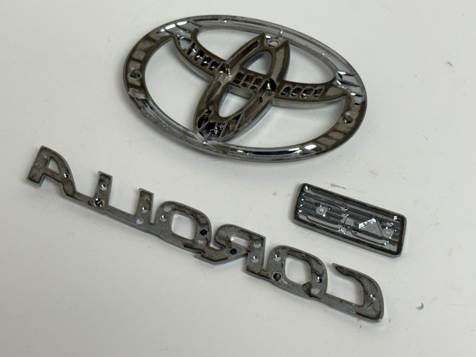 2011-2013 Toyota Corolla LE OEM rear liftgate emblem set 75442-02380