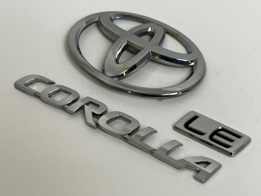 2011-2013 Toyota Corolla LE OEM rear liftgate emblem set 75442-02380