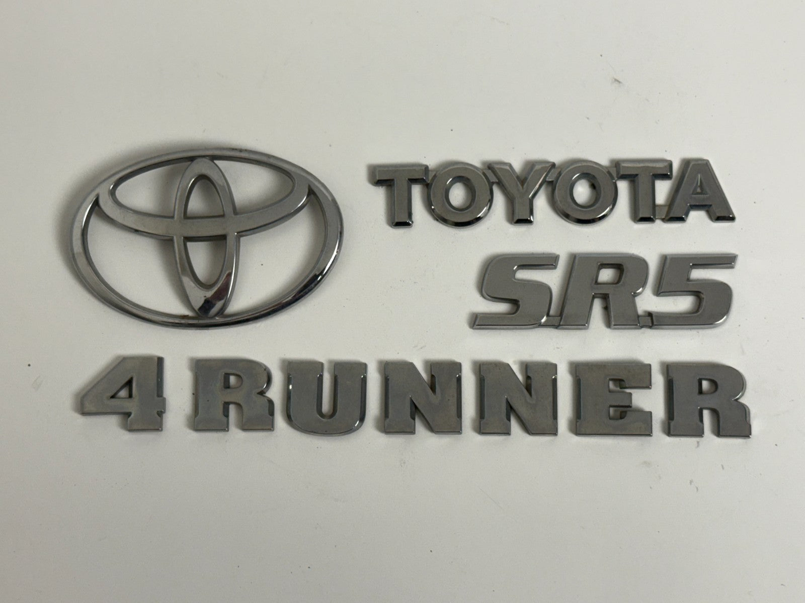 2003-2005 Toyota 4Runner SR5 OEM rear liftgate emblem set 75441-35020