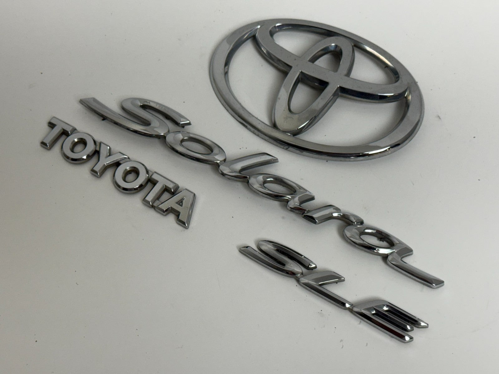 2004-2007 Toyota Solara SLE XV30 OEM rear liftgate emblem set 75442-AA040