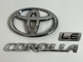 2011-2013 Toyota Corolla LE OEM rear liftgate emblem set 75442-02380