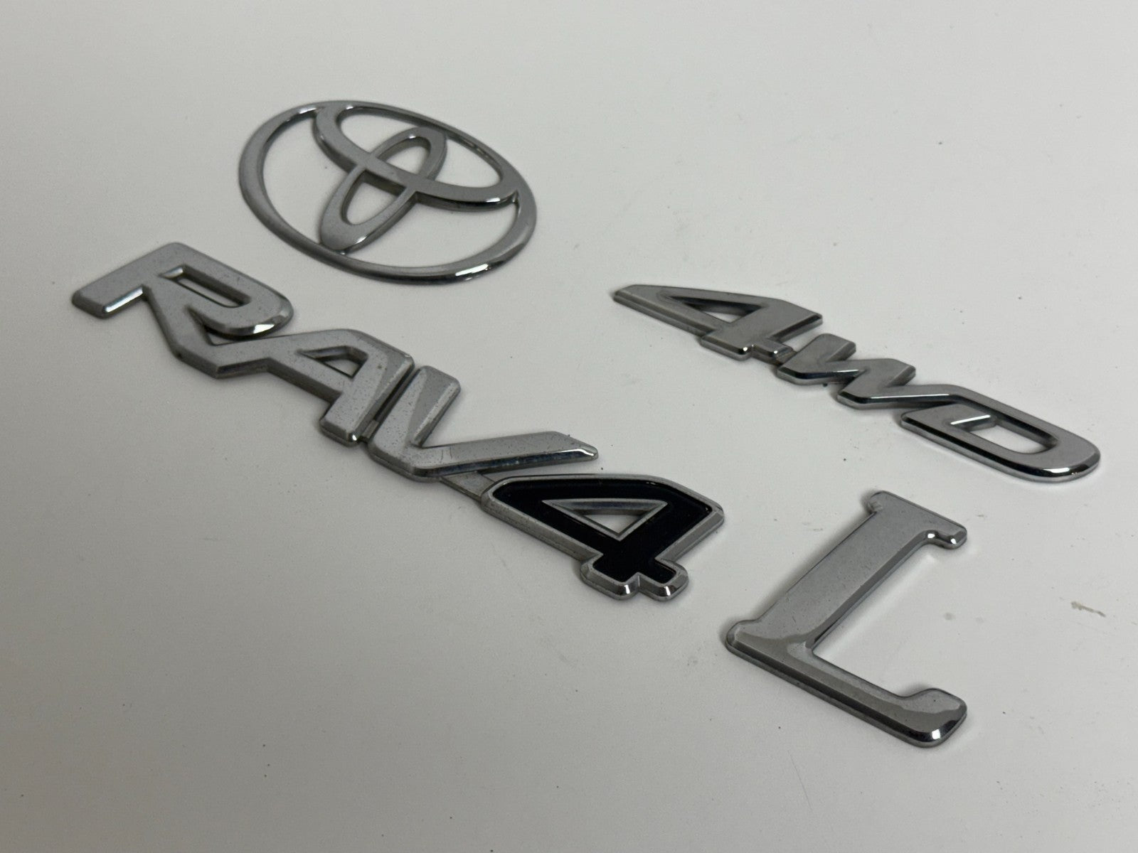 2006-2008 Toyota RAV4 L 4WD XA30 OEM rear liftgate emblem set 75431-0R060