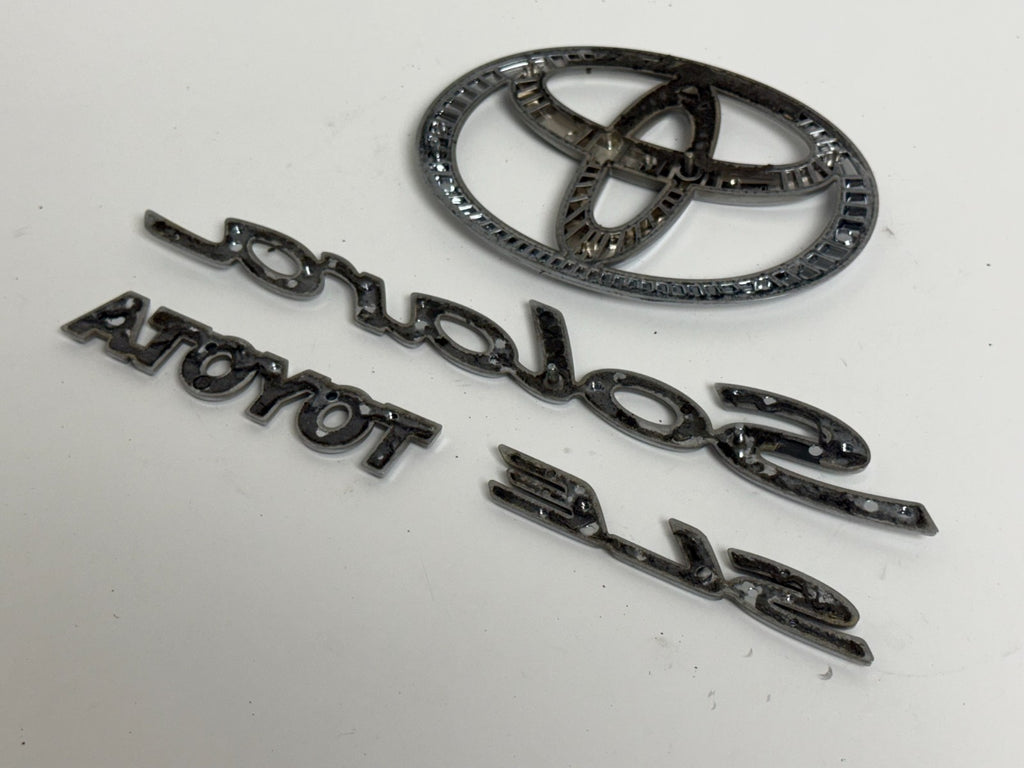 2004-2007 Toyota Solara SLE XV30 OEM rear liftgate emblem set 75442-AA040