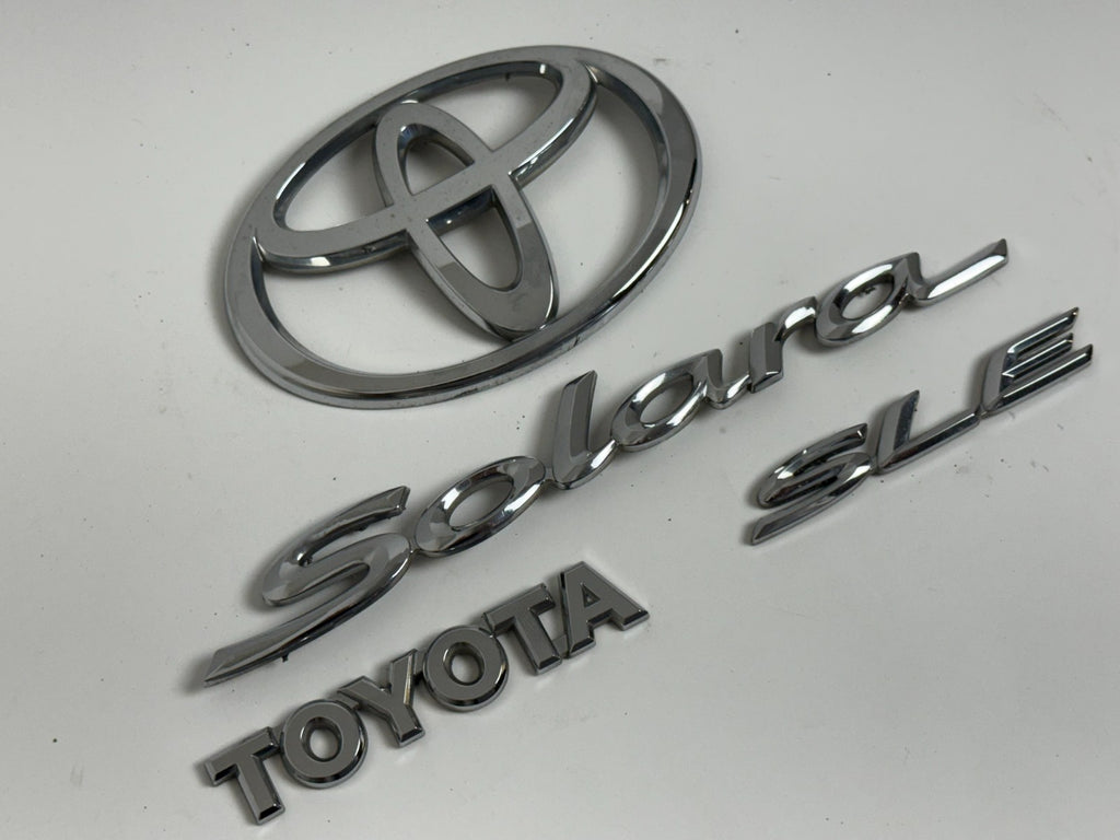 2004-2007 Toyota Solara SLE XV30 OEM rear liftgate emblem set 75442-AA040