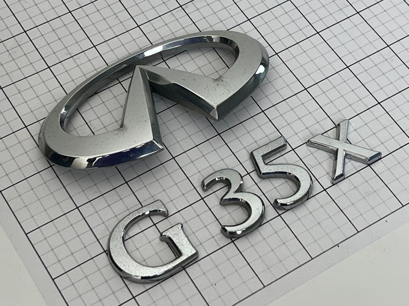 INFINITI G35x Sedan 03 - 06 Trunk Emblem Badge Logo Full Set