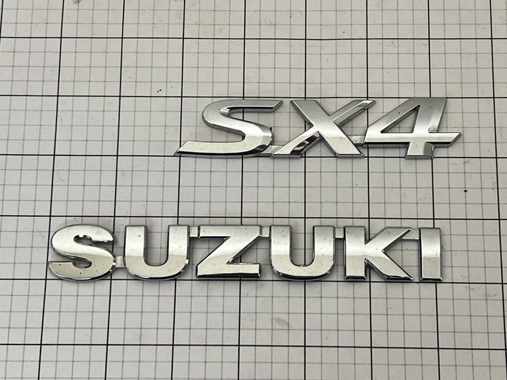 SUZUKI Sx4 Rear Trunk Emblem Badge Logo