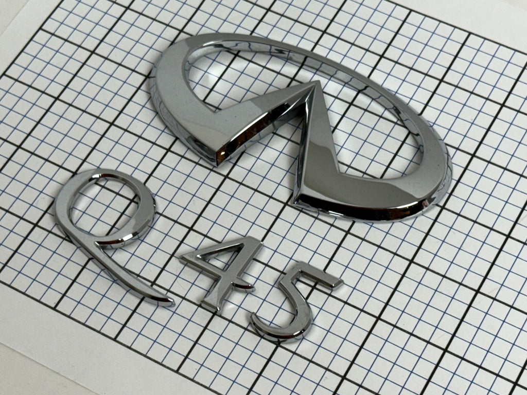 INFINITI Q45 Sedan 2001 Trunk Emblem Badge Logo