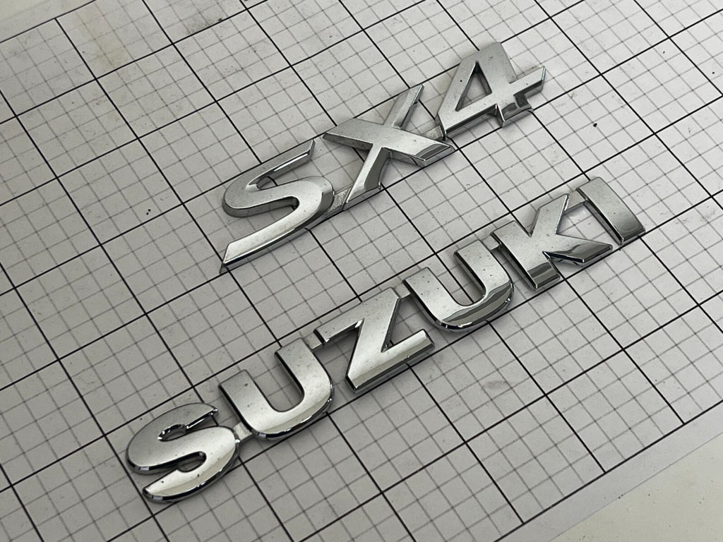 SUZUKI Sx4 Rear Trunk Emblem Badge Logo